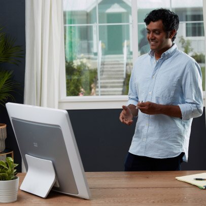 A professor gives a lecture using his Webex Desk Series