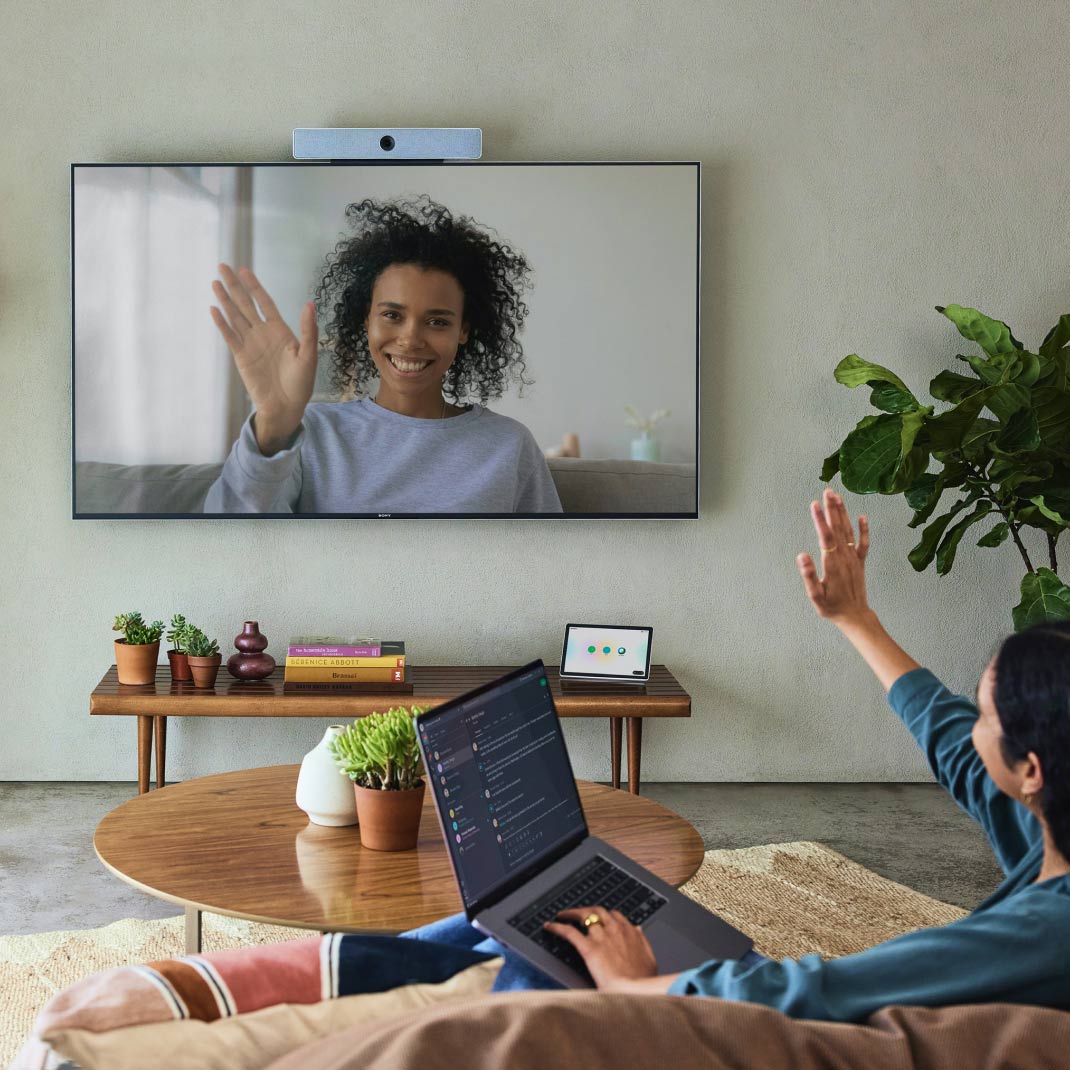 People enjoying an immersive experience with the Webex Room Kit